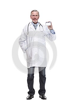 Portrait of medical doctor in face mask arms crossed, standing