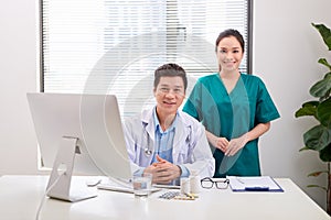 Portrait of medical doctors working together in office