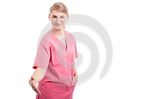 Portrait of medical nurse offering hand shake