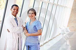 Portrait Of Medical Staff In Corridor Of Hospital