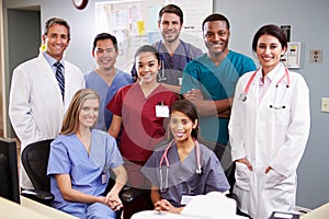 Portrait Of Medical Team At Nurses Station