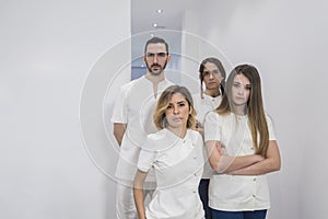 Portrait of medical team standing in hospital hall