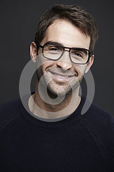 Portrait of mid adult man wearing glasses