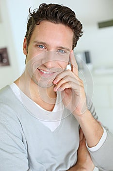 Portrait of middel-aged man smiling at camera