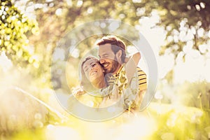 Portrait of middle age couple at nature. Enjoy in spring season.