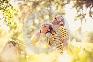 Portrait of middle age couple at nature. Happy and in love.