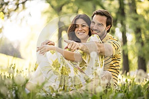 Portrait of middle age couple at nature. Spring season.