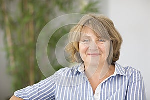 Portrait of middle age woman in the room