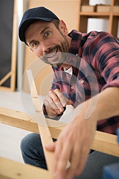 portrait middle-aged bearded man working indoors