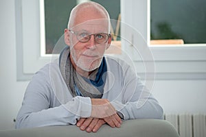 Portrait of middle-aged man with beard and glasses