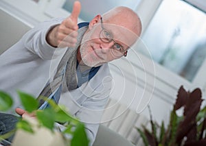 Portrait of middle-aged man with beard and glasses