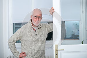 Portrait of middle-aged man with beard and glasses