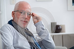 Portrait of middle-aged man with beard and glasses