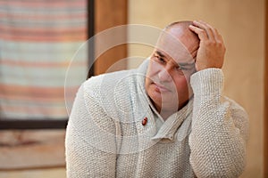 Portrait of a middle-aged man outdoors.