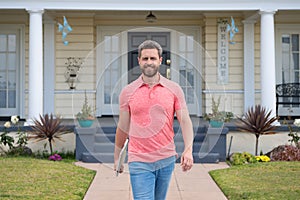 Portrait of middle-aged man satisfied with life success. Confidence and business concept. Businessman standing in front