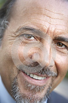 Portrait Of Middle Aged Man Smiling At The Camera