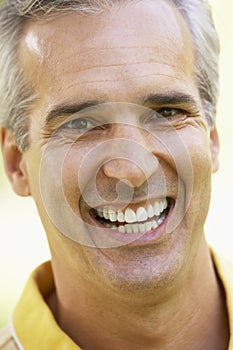 Portrait Of Middle Aged Man Smiling At The Camera