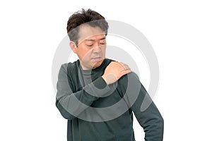 Portrait of a middle-aged man suffering in shoulder pain