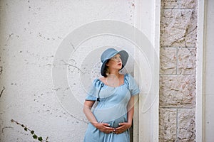 Portrait of middle aged pregnant woman. Maternity, pregnancy concept. Travel during pregnancy