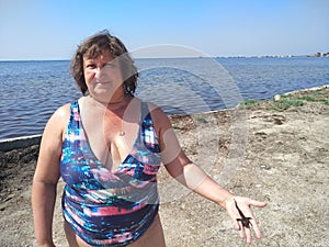 Portrait of a middle-aged woman on the beach