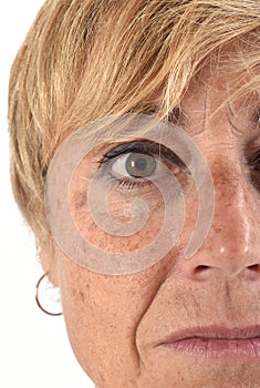 Portrait of a middle aged woman on black