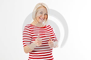 Portrait of middle-aged woman showing thumbs up on white background, middle age woman show like sign over white