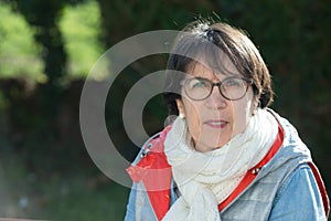 Portrait of middle-aged woman in the spring sun