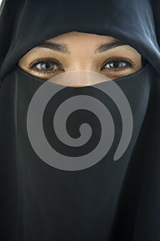Portrait of a middle eastern woman wearing black