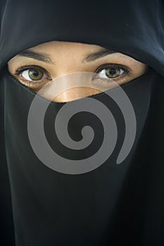 Portrait of a middle eastern woman wearing black