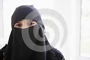 Portrait of a middle eastern woman wearing black