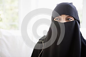 Portrait of a middle eastern woman wearing black