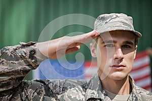 Portrait of military soldier giving salute