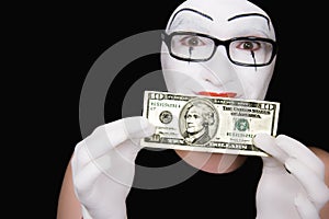 Portrait of mime with 10 dollar denomination