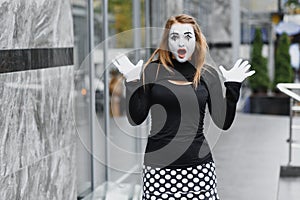 Portrait of a mime comedian. mime girl on the street