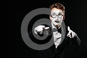 Portrait of mime man on black background