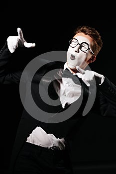 Portrait of mime man on black background