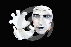 Portrait of the mime in white gloves