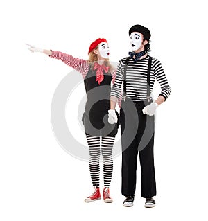 Portrait of mimes. woman pointing at something