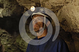 Portrait of a miner inside a mine photo