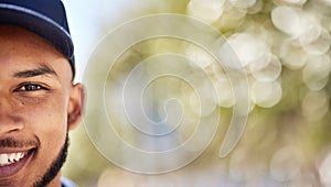 Portrait, mockup and blurred background with a man in nature, outdoor during summer for adventure. Half face, smile and