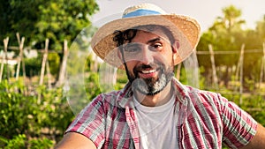 Portrait of modern bearded farmer man take break with hoe in agricultural field