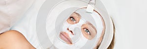 Portrait of moisturizing mask on white background for medical design. Woman