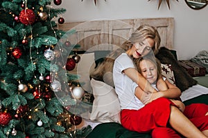 Portrait of mom and daughter in  Christmas