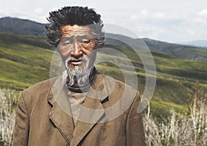 Portrait Mongolian Man Field Senior Tranquil Solitude Concept