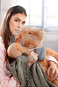 Portrait of morning cuddle with teddy bear