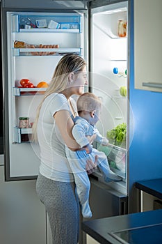 Portrait of mother and baby looking for something to eat in the