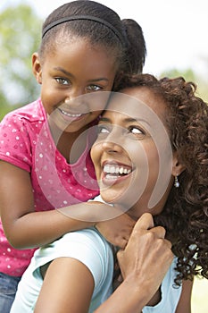 Portrait Of Mother And Daughter In Park