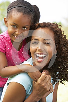 Portrait Of Mother And Daughter In Park