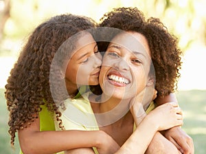 Portrait Of Mother And Daughter In Park