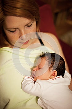 Portrait of mother and newborn baby